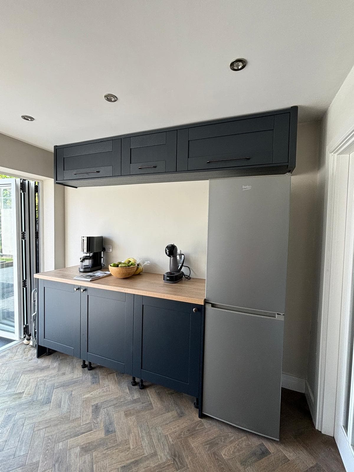 Row of kitchen cabinets and worktops